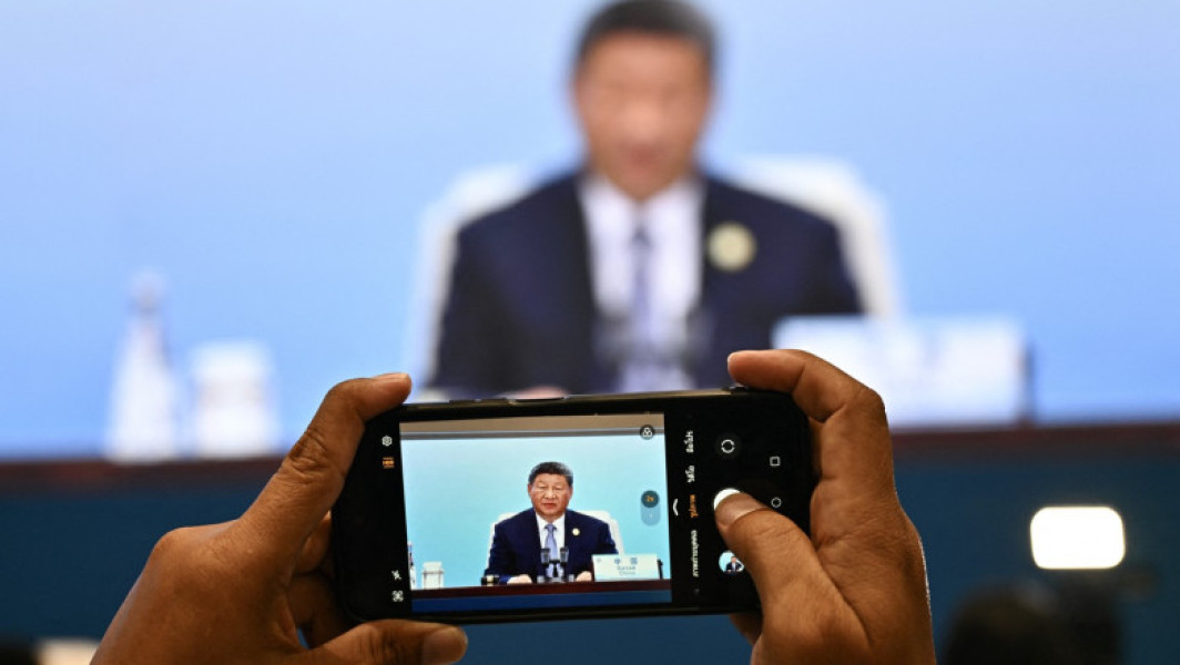 Xi Jinping îndeamnă liderii la o ordine economică și de securitate globală, în timp ce Putin sprijină multipolaritatea